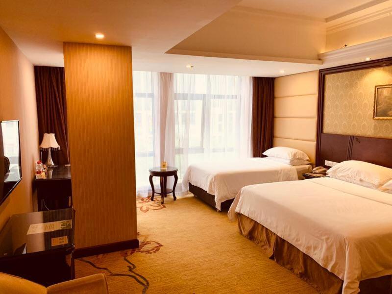 Vienna Hotel Shanghai Happy Valley Сунцзян Экстерьер фото